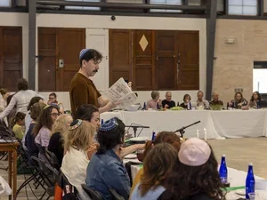Music faculty member leads Passover Seder.