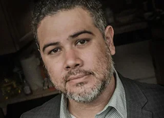 Manuel Gonzales headshot