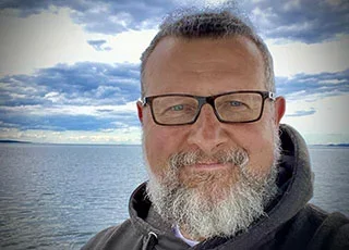 Paul Baker-Porazinski headshot